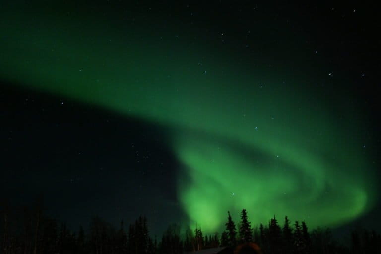 Northern lights in Northwest Territories, Canada. Image by Hideyuki Kamon via Flickr (CC BY-NC-ND 2.0).