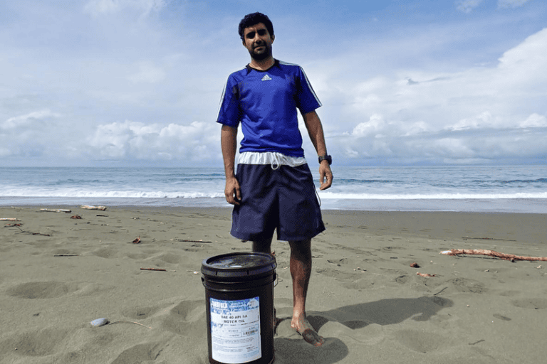 A bucket of used motor oil found at Piro Beach during the debris event.