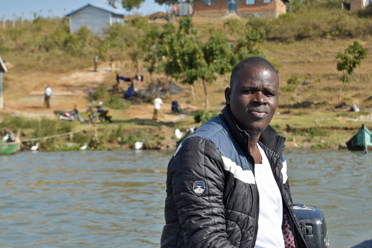 Shalton Omolo steering his boat offshore.