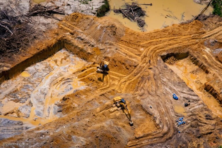 Excavators used to build an illegal road inside the Yanomami Indigenous territory of Brazil. The 150 km long road in the Catrimani River basin made it possible for heavy gold mining machinery to enter Yanomami lands for the first time. Image by Valentina Ricardo for Greenpeace.