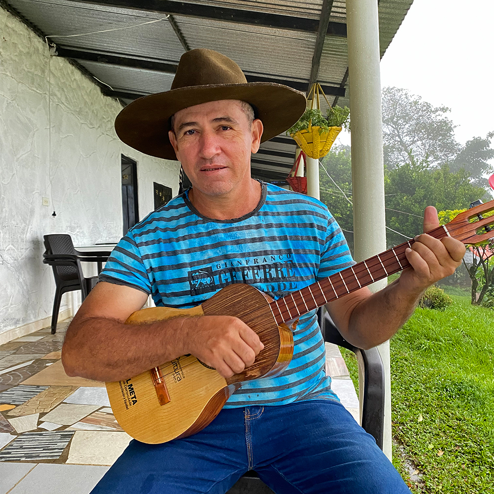 Simey Sierra playing the cuatro. 