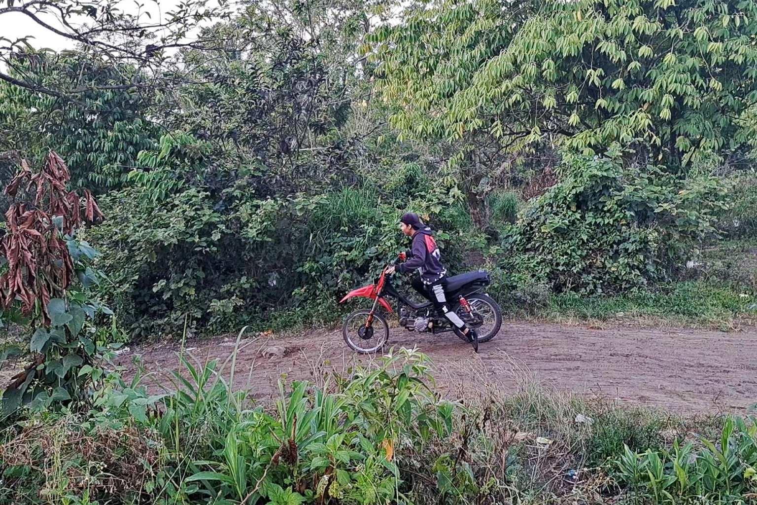 A man on a motorcycle.