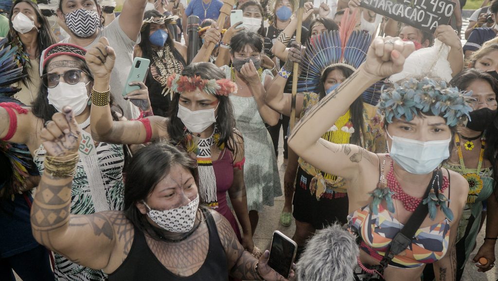 Alessandra Korap Munduruku and others at the first Indigenous Women's March in Brazil, August 2019 Photo by Leo Otero.