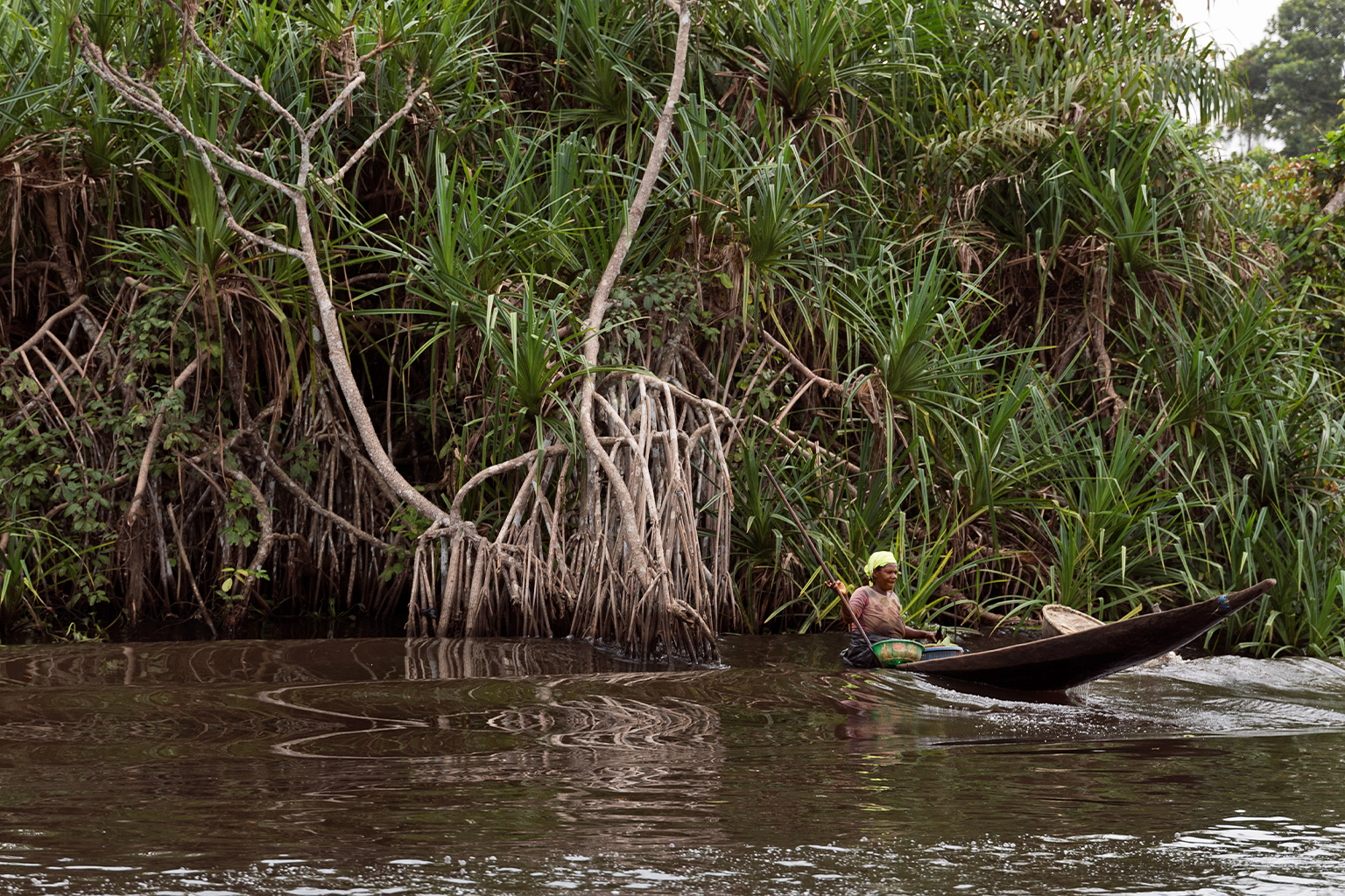 A woman in a boat.