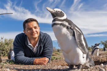 Pablo Borboroglu with a Magellanic penguin