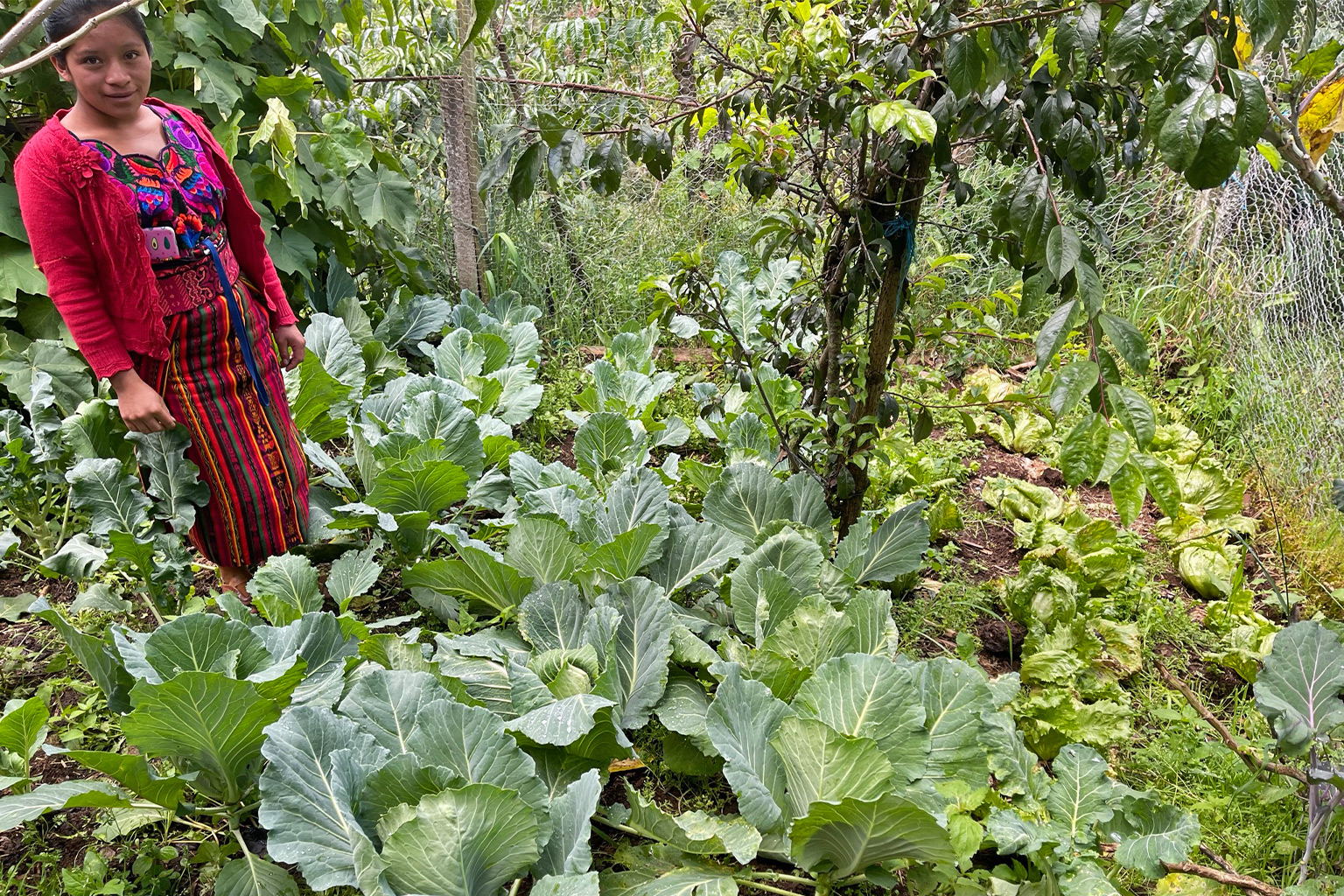 A farmer with her crops.