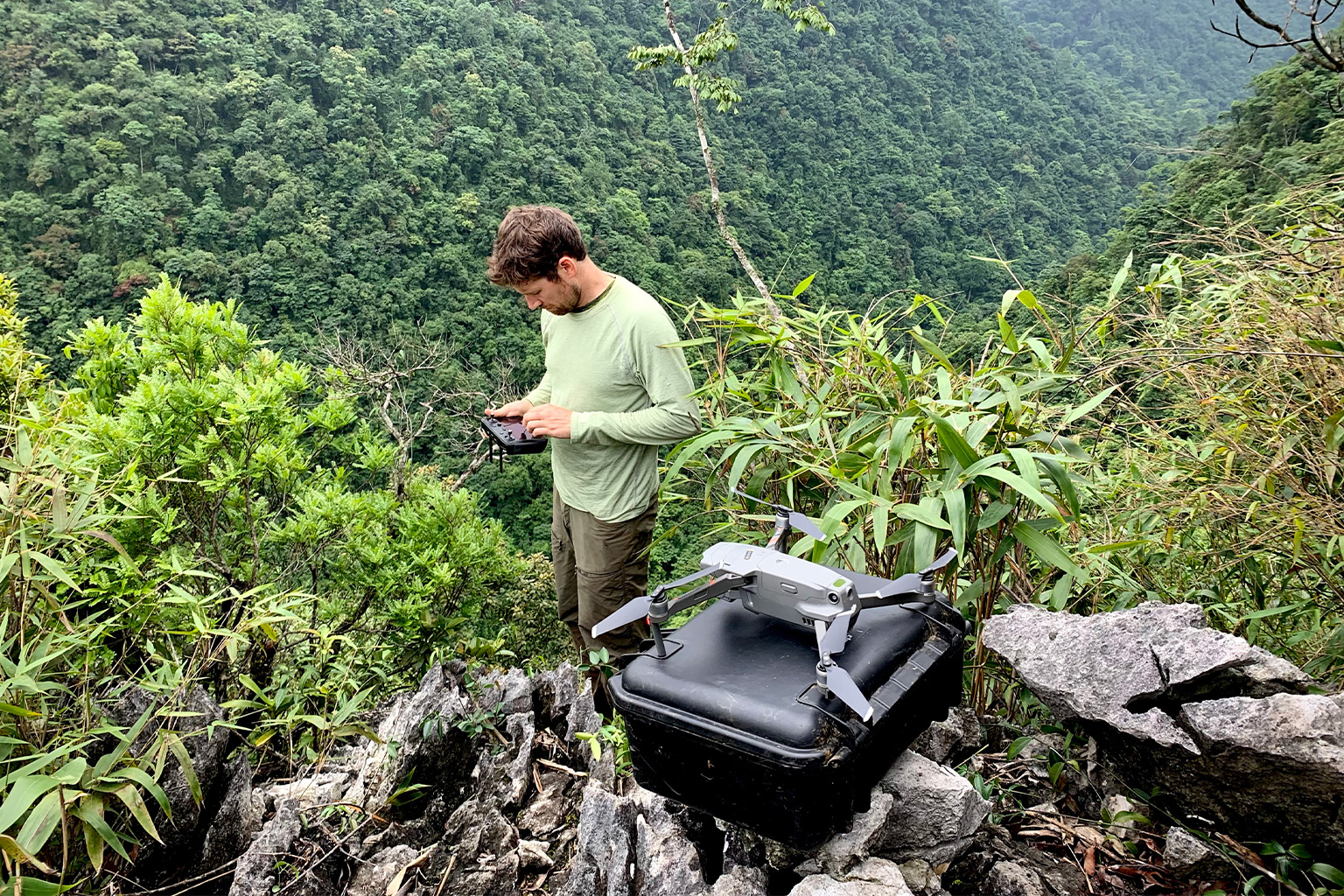 A conservationist with a drone.