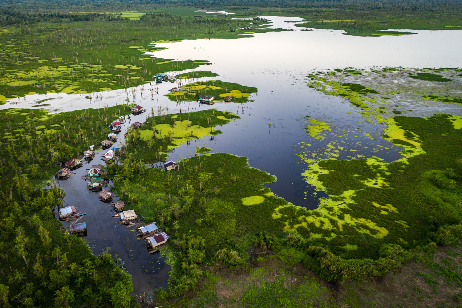 These houses were once built as reminiscent to the center of the lake as seen afar by the 2 floating structures.