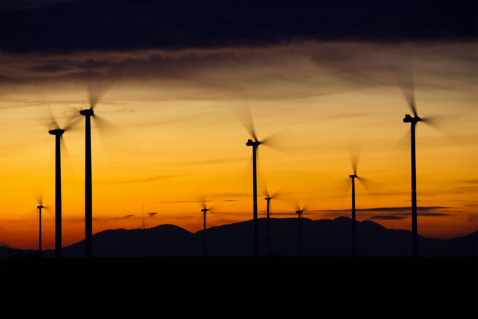 Windmills in the sunset.