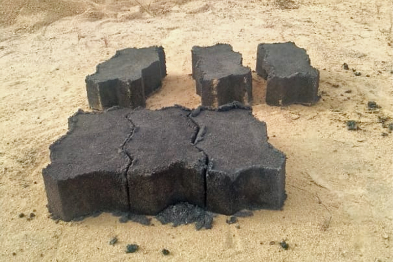 Some of the paving bricks made by Chiwera from plastic waste mixed with sand.