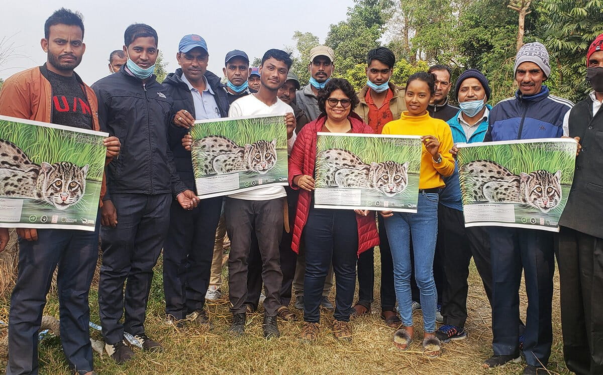 Raising awareness about fishing cats during an education program.