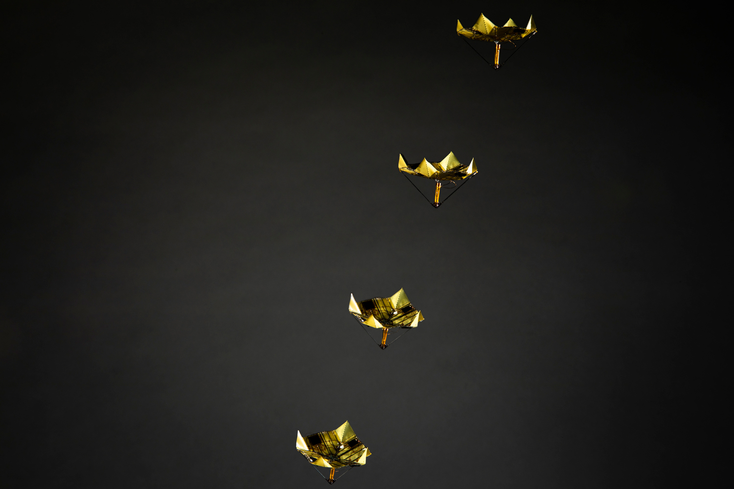 Origami-based microfliers developed by researchers at the University of Washington can be triggered to change shape mid-air to ensure they have different trajectories.