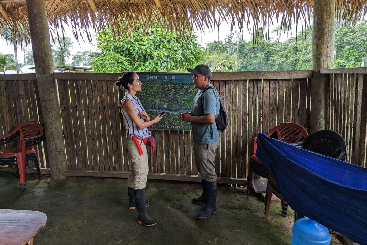 Ana Alvarado of Mongabay Latam reporting on an Indigenous community in the Ecuadorian Amazon.