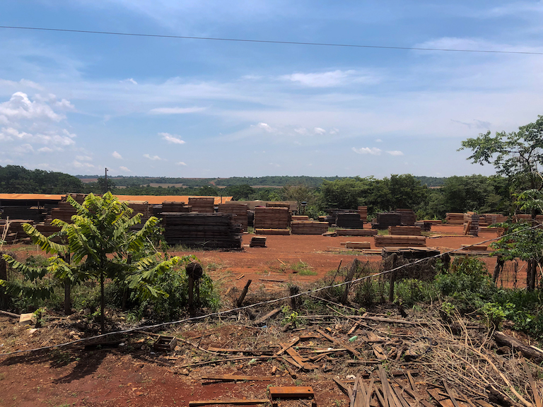 Timber production along the BR-163 highway in Itaüba, Mato Grosso state. A migrant wave of loggers, miners and farmers first arrived in the Amazon in the 1970s as part of an ambitious plan to populate the rainforest, hatched by the military dictatorship that governed Brazil at the time. Ana Ionova for Mongabay.