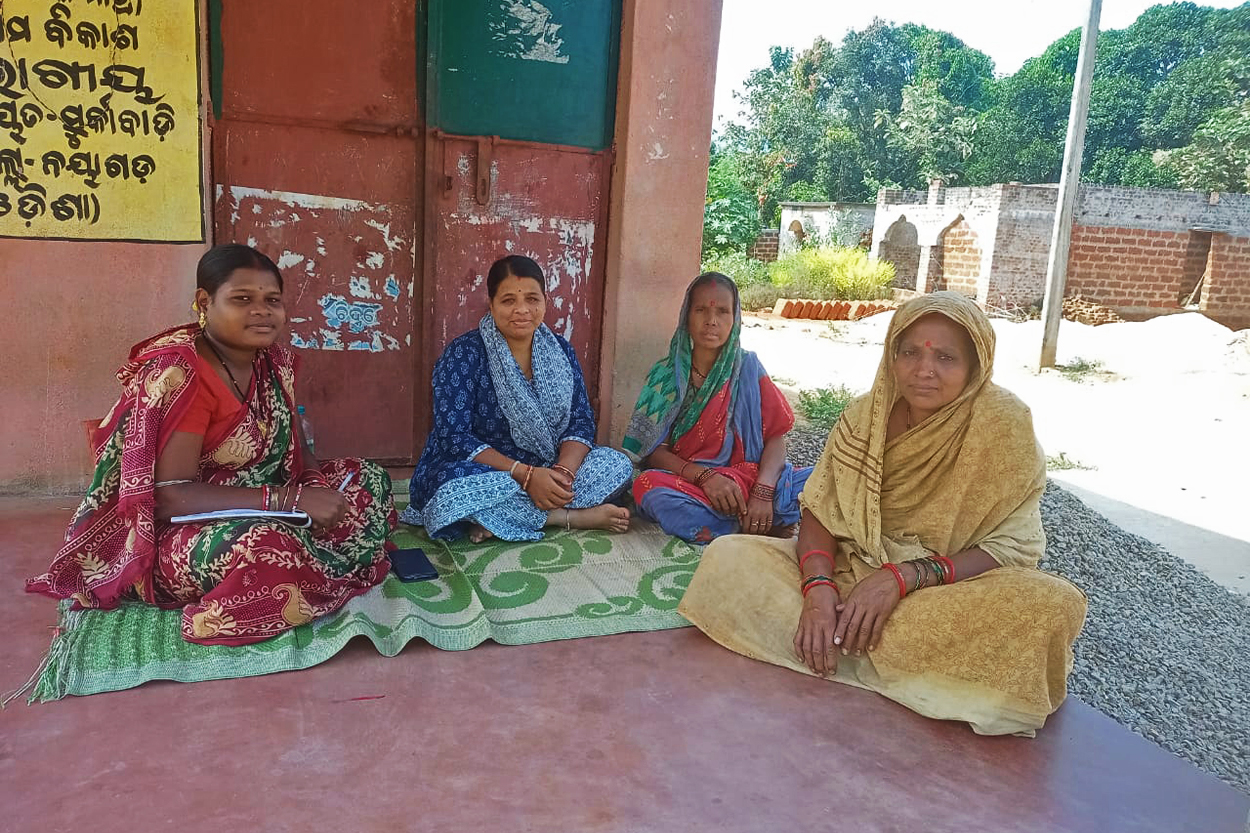 Pramila Pradhan, 51, second from right, treasurer of Kodalpalli's forest protection committee. 