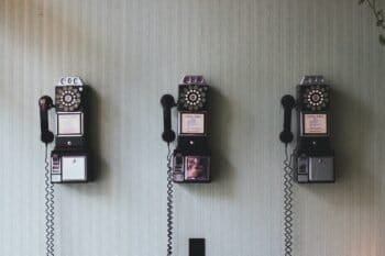Vintage telephones by Pavan Trikutam via Unsplash.