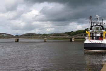 A trawler docked in a harbour in Scotland.