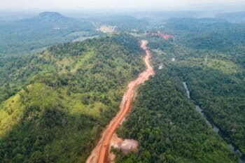 Before any dam is built, roads are needed, opening up the old-growth forest of the Cardamom Mountains. Image by Gerald Flynn / Mongabay.