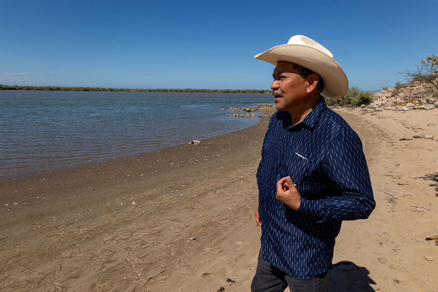 Mario Luna Romero, a Yaqui water defender and spokesperson for the tribe, looks out at Guasimas Bay