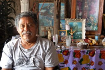 Alexandrino Garcia, an Abuelos de Tajín, in front of a Totonac altar in his house. Image by Monica Pelliccia.