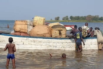 A boat arrives at Chikombe Beach with a haul of fish from Mbenje Island – . Image by Charles Mpaka for Mongabay.