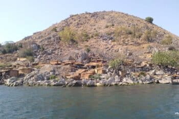 Fishers camp in grass shelters at Mbenje Island, which is located 10 kilometers (6 miles) from the beachshore of Lake Malawi, in a cluster of fivesix islands. – Image by Charles Mpaka for Mongabay.
