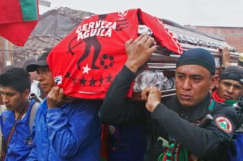 Carlos’ fellow guardians carry his coffin