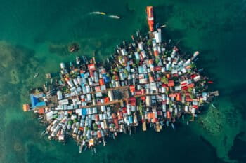 Families are migrating from Gardi Sugdub, a tiny island belonging to the Indigenous Guna Yala people of Panama, packed with houses to the edge of the water, due to sea level rise.