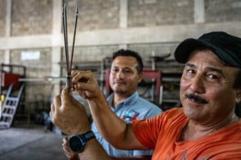 Mario Motiño Sr. (front) and Mario Motiño Jr. (back), are trying out the new spears.