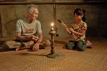 A Dayak elder with a young member in Sungai Utik.