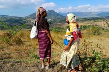 Indigenous women look at their living space disappear to become Lambo Dam.