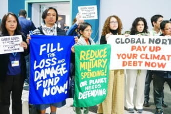 Banner image of civil society groups protesting at COP29 in Baku, Azerbaijan. Image courtesy of 350.org.
