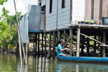 Jenebora fishers say commercial ships anchoring in fishing grounds have squeezed local catches.