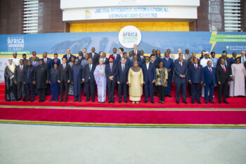 Banner image of African heads of states and partners at the Mission 300 energy summit courtesy of the African Development Bank Group.