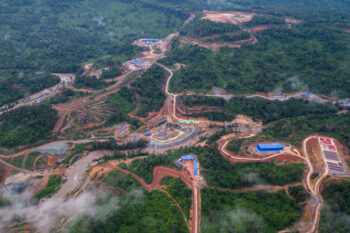 In October 2024, deforestation linked to the construction of the Middle Russei Chrum dam was already spilling over into the Southern Cardamom REDD+ project area. Image by Gerald Flynn / Mongabay.