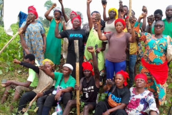 Women living near the Socapalm plantation in Edéa take part in a demonstration against replanting in January 2025. Image courtesy of Félicité Ngo Bissou/AFRISE.