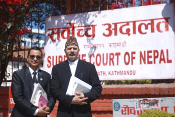Nepali lawyers Padam Bahadur Shrestha and Dilra Khanal in front of Nepal's Supreme Court. Image by Dipendra Dungana.