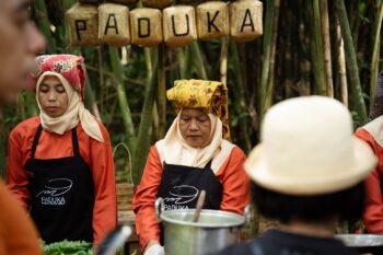 The Paduka community cooking for visitors.