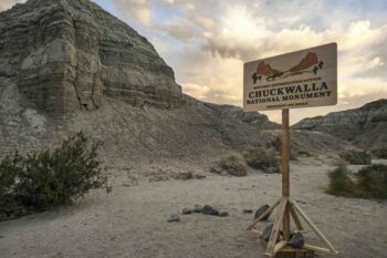 A sign is set up ahead of President Joe Biden's visit to the Chuckwalla National Monument, Jan. 7, 2025, to the Coachella Valley, Calif. (AP Photo/Damian Dovarganes, File)