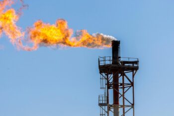 Banner image of a flare stack by Yerevan Malarerva via Pexels.