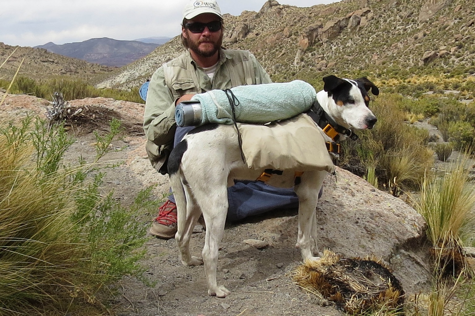 Juan Reppucci and his dog Monty who acts as both field trip companion and guide for AGA research teams. “If it's dark, I follow the dog because he knows the way,” Reppucci says.