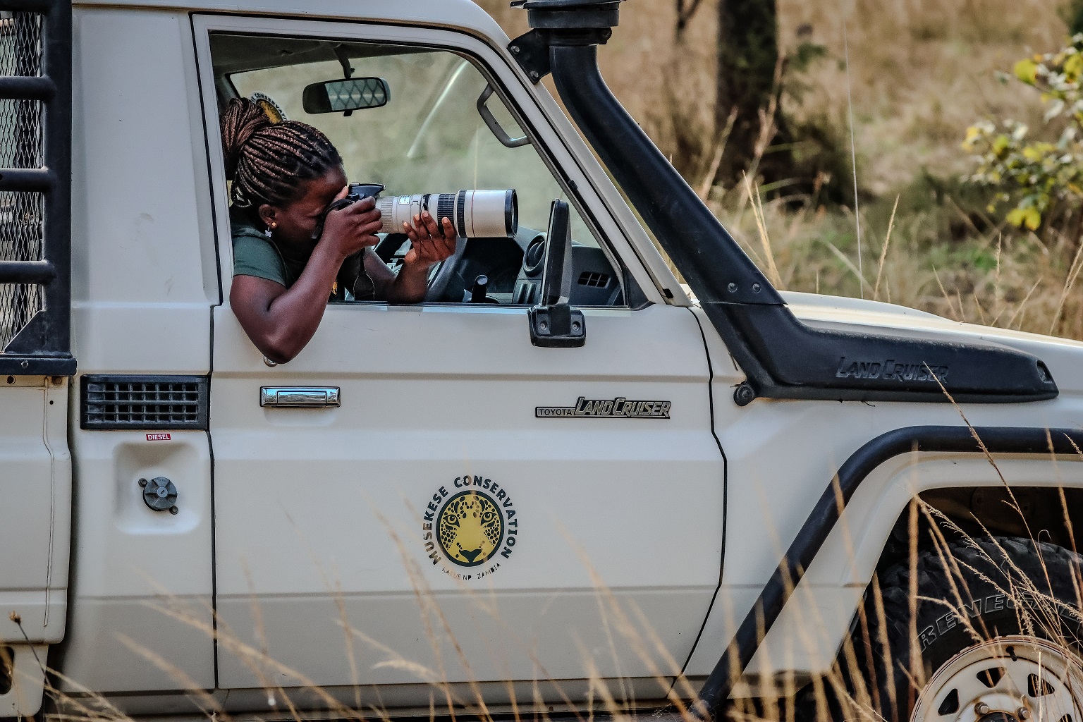 Chisomo M’hango conducting fieldwork in the Musekese Lumbeya section of Kafue National Park.