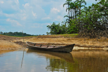 Boat in the Cuyabeno Wildlife Reserve in Ecuador's Amazon. Image by Ranil Wijeyratne via Flickr (CC BY-NC-SA 2.0).
