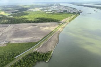 The nearly $3 billion Mid-Barataria Sediment Diversion project along the Mississippi River, intended to stave off coastal land loss in southeastern Louisiana, is seen during a flyover with the environmental coalition group Restore the Mississippi River Delta, Aug. 29, 2024. (AP Photo/Jack Brook, File)