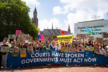 Campaigners in The Hague, Netherlands, where the ICJ gave its advisory opinion. Image courtesy of Tengbeh Kamara/Greenpeace.