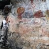 Park guide Luana Wanessa Assunção points at the remarkable Painel do Pilão, which could be the first-ever solar calendar of the Americas.