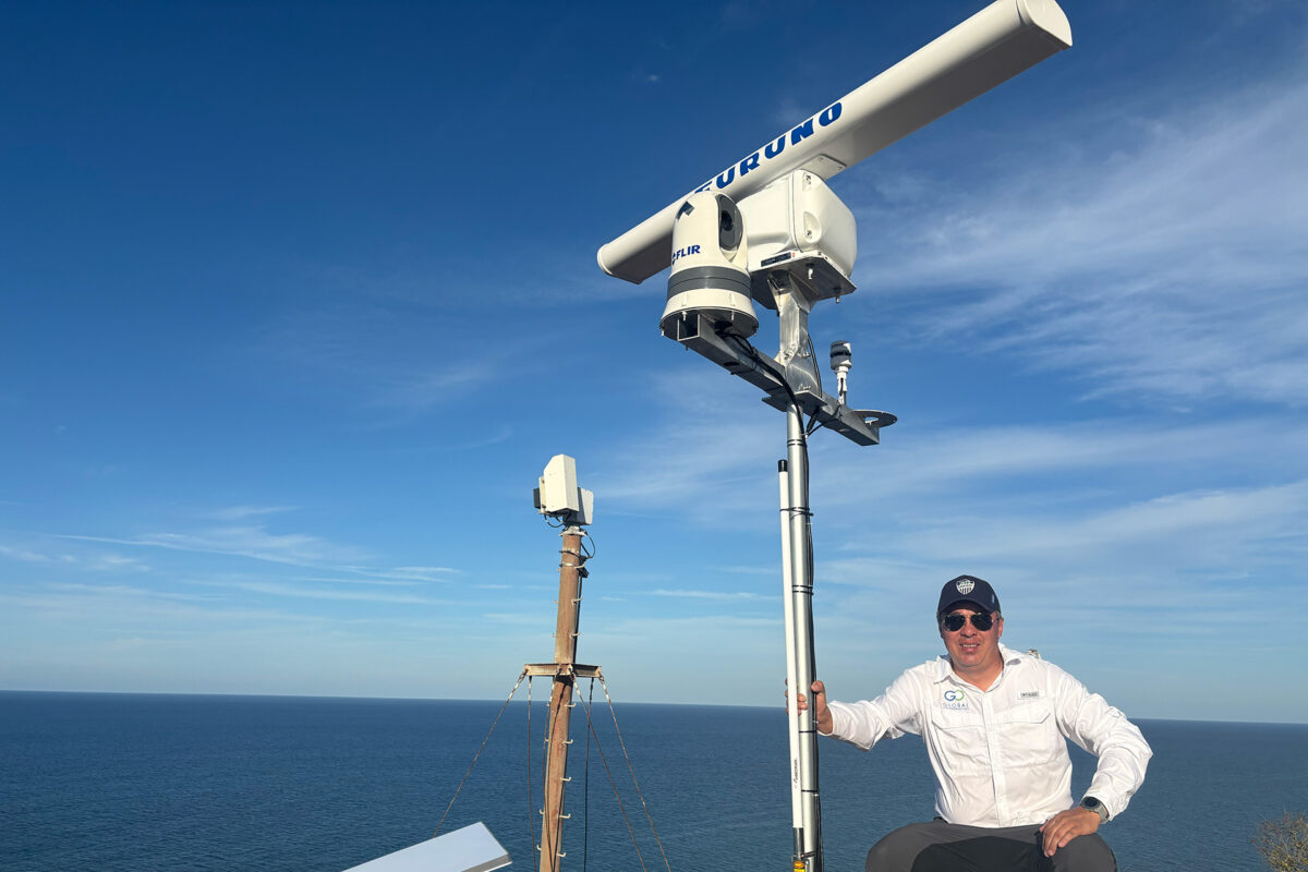 Alejandro González next to a radar monitoring system set up by Global Conservation. Courtesy of González.