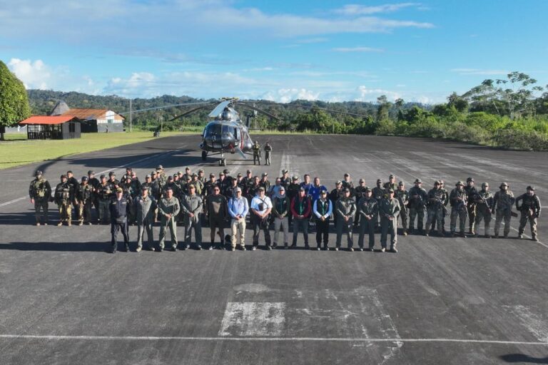 police group with helicopter on runway