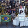 Indigenous participants at the Free Land Camp on April 10, where they discuss rights, territorial protection, and their role in COP30. Image by AP Photo/Eraldo Peres.