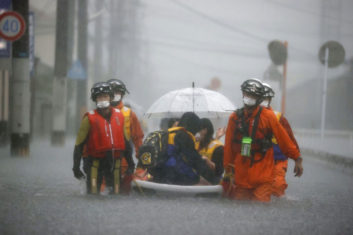 photo of Torrential rains in southern Japan cause flooding & mudslides, several people missing image